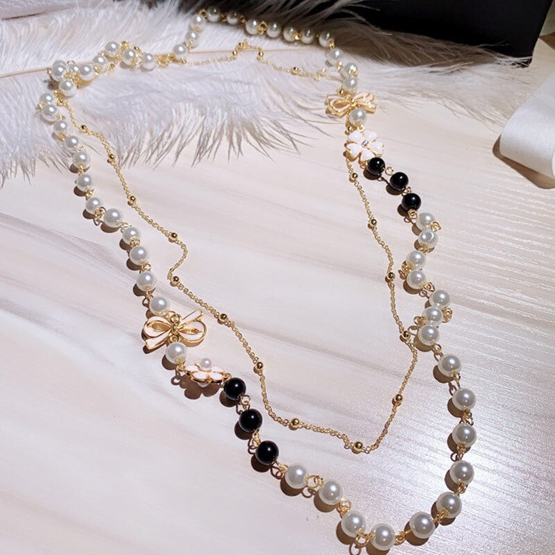 Vòng cổ Dài Nhiều Lớp Đính Hạt Ngọc Trai Và Nơ Xinh Xắn