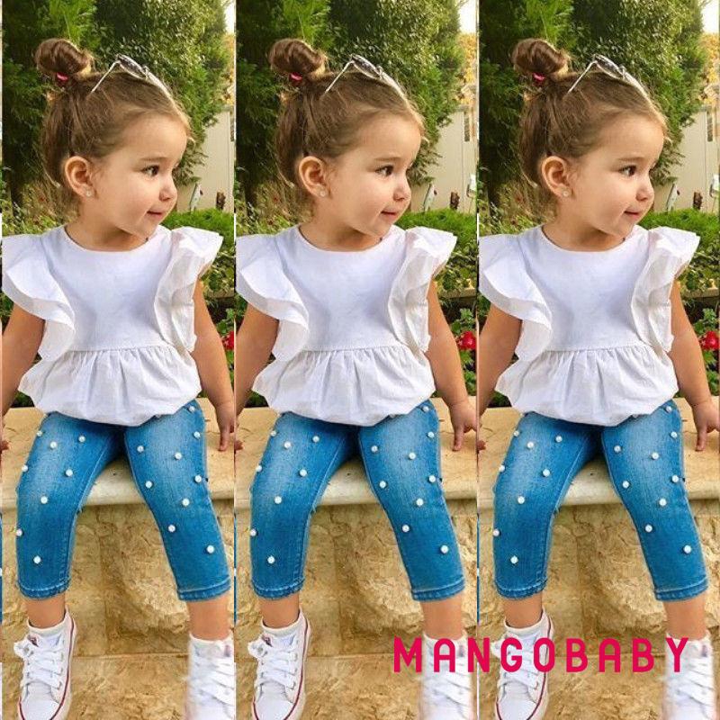 Set áo thun đính ngọc trai + quần denim cho bé gái