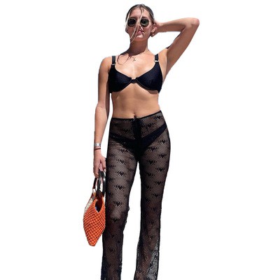 W21PT148 European and American women's 2021 summer new solid color mesh pattern perspective flared trousers casual pant