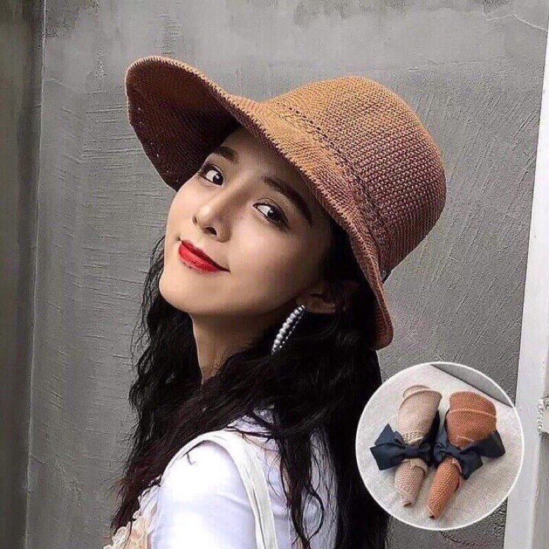 Nón cối rộng vành đính nơ đi biển , dạo phố, nón gấp gọn tiện dụng mang theo.