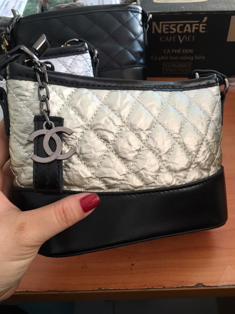 Túi đeo pha màu,da dập