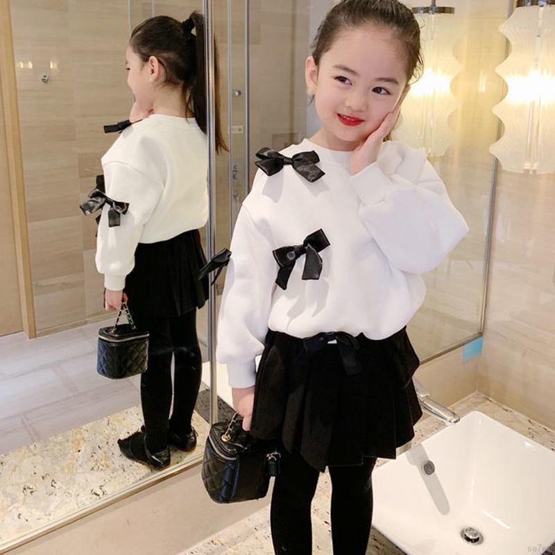 Áo sơ mi tay dài đính nơ màu trơn thời trang mùa thu cho bé gái Se7en