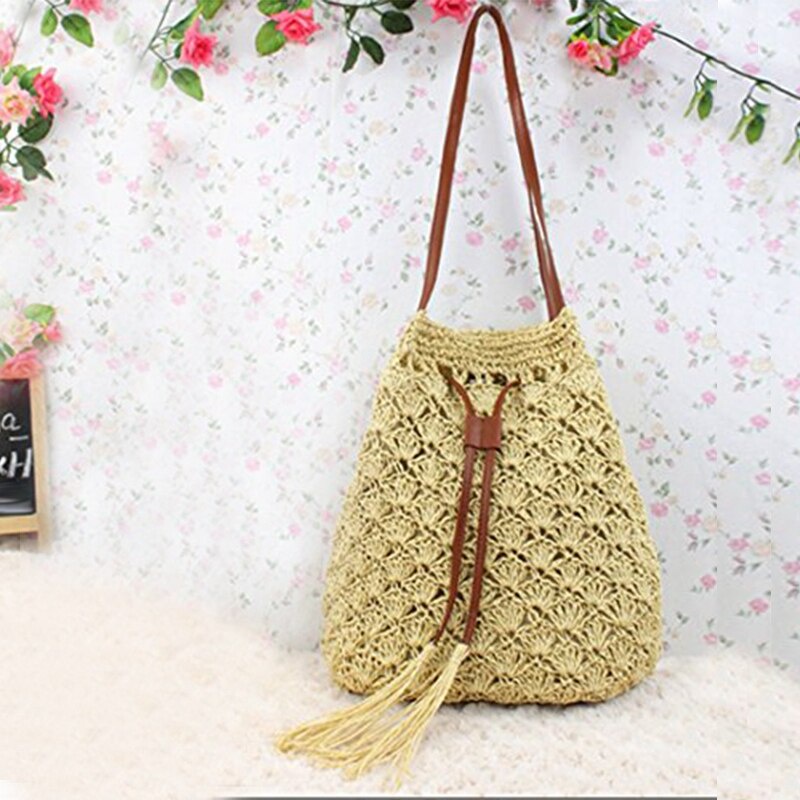 Túi cói Bucket đeo vai - dây rút tua rua - đan hoa văn vỏ sò - phong cách Vintage