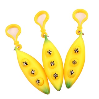 Móc khoá squishy quả chuối bóp ra mặt cười