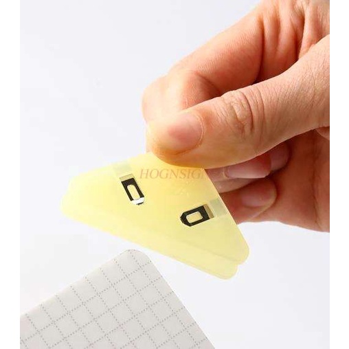 Kẹp giấy,kẹp góc chống cong hình tam giác bằng nhựa thiết kế dễ thương có nhiều màu xắc bắt mắt