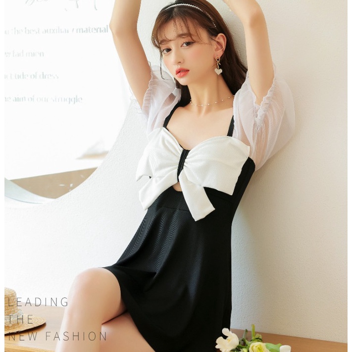 Bộ đồ bơi nữ liền thân dáng váy nơ xinh tay phối voan trắng