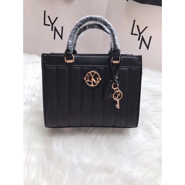 Túi L.Y.N quai cầm kèm dây da đeo chéo sz25cm