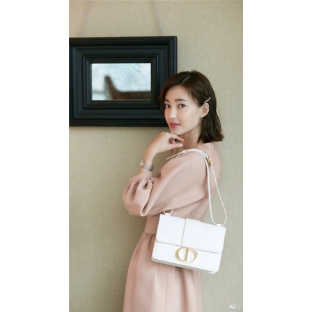 Túi trắng khoá vàng da trơn