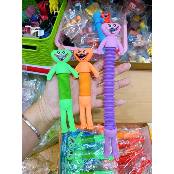 Ống lò xo kéo dài thu gọn Huggy Wuggy, Unicorn, Cún Xúc Xích, Lạc Đà đồ chơi cho bé
