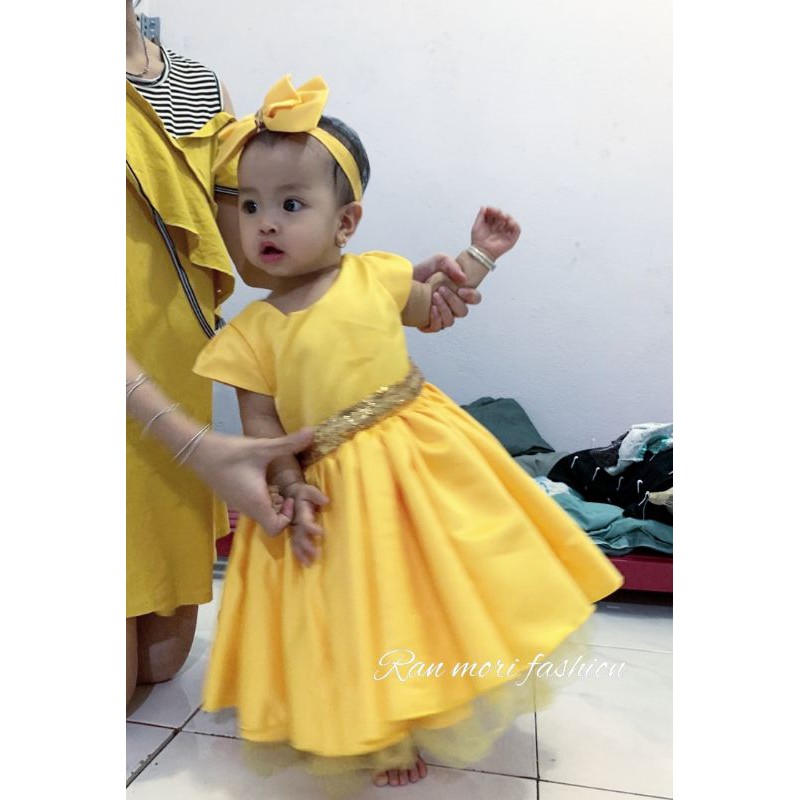 đầm công chúa màu vàng cho bé iu