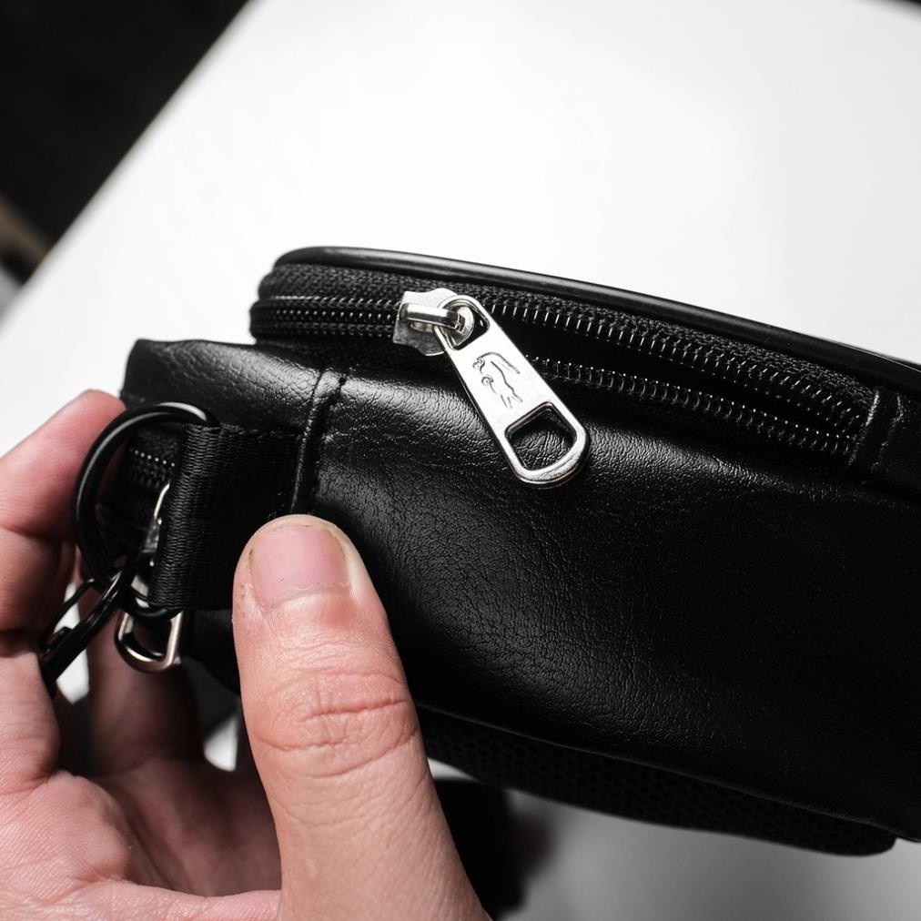 Túi đeo chéo LACOSTE CHỮ KÝ FULL HỘP Size 26cm x 16cm x 7cm  • Chất liệu simili xịn , chuẩn cty  • Khoá kéo La coste