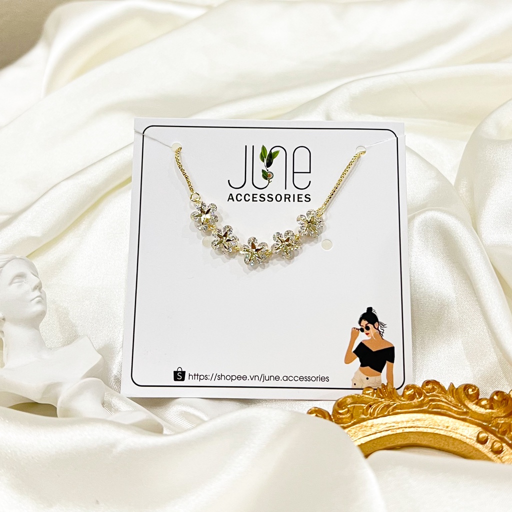 Lắc tay nữ titan mặt hoa mai đính đá bền màu dây rút tự điều chỉnh kích thước thời trang Hàn Quốc June accessories