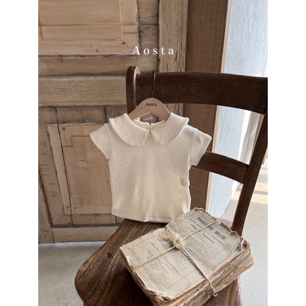 Áo cổ sen thun gân bé gái Aosta