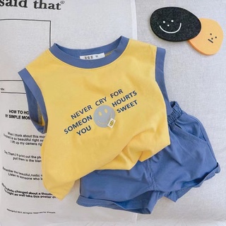 Set áo thun không tay và quần short in hình mặt cười cho bé