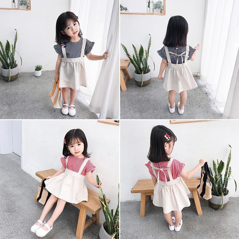 Set áo sơ mi ngắn tay + chân váy caro đính nơ dễ thương cho bé gái