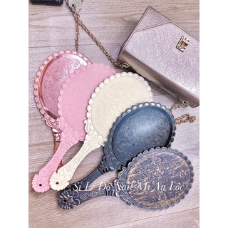 Gương soi cầm tay