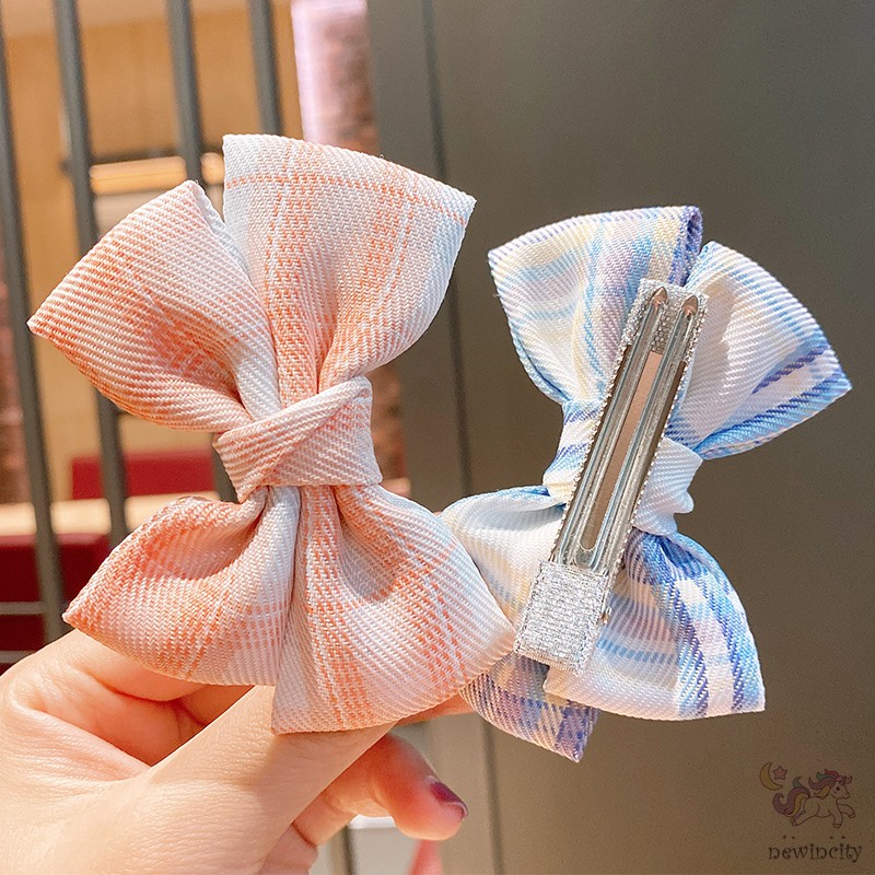 Kẹp tóc đính nơ kẻ sọc ca rô xinh xắn dành cho bé gái