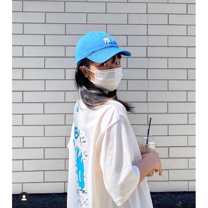 Áo trắng logo xanh