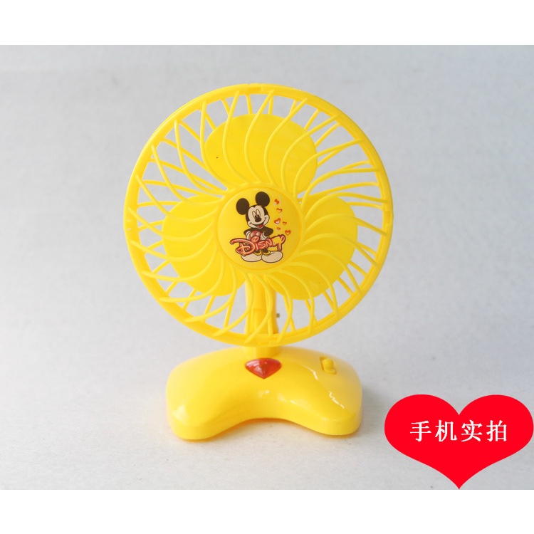 quạt cầm tay mini chạy pin tiện lợi.