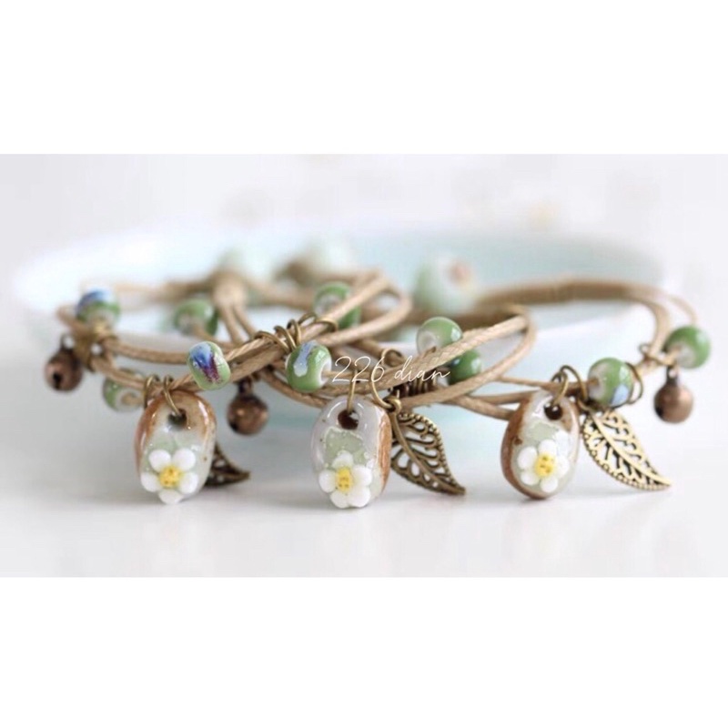 Vòng gốm handmade hoa dài  màu vàng xinh xắn