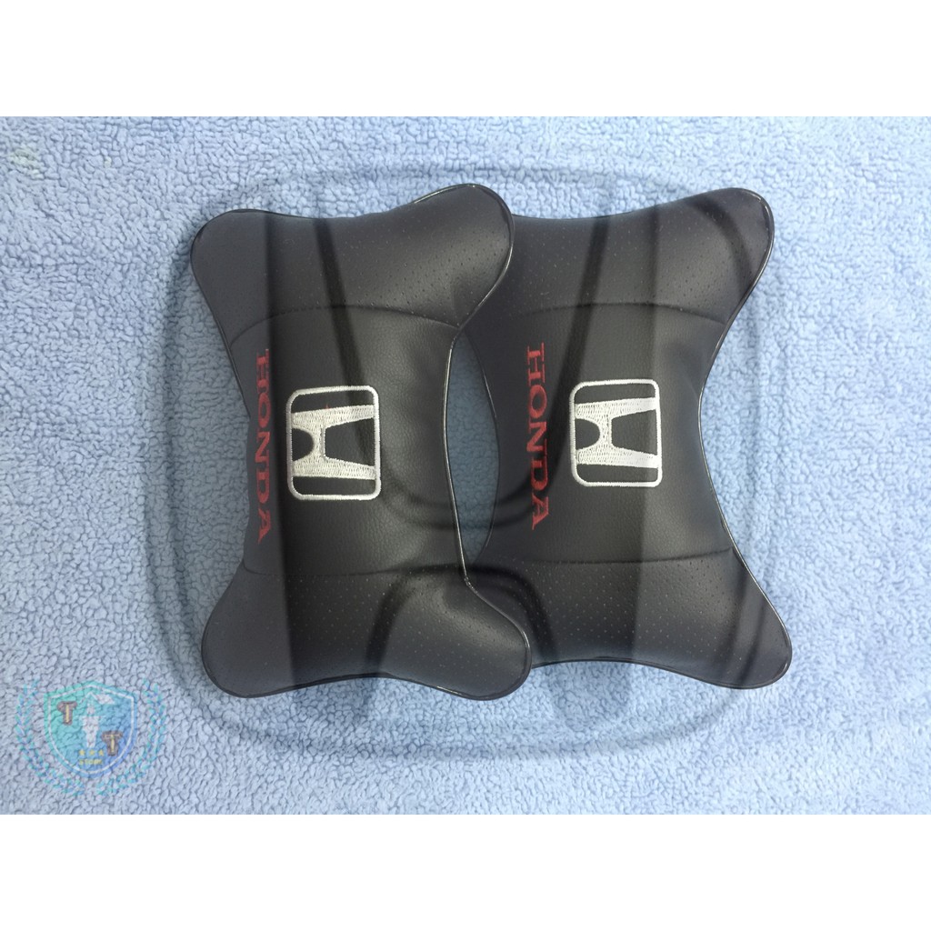 Gối tựa đầu bằng da cho ghế xe ô tô có gắn logo của các hãng xe | BigBuy360 - bigbuy360.vn