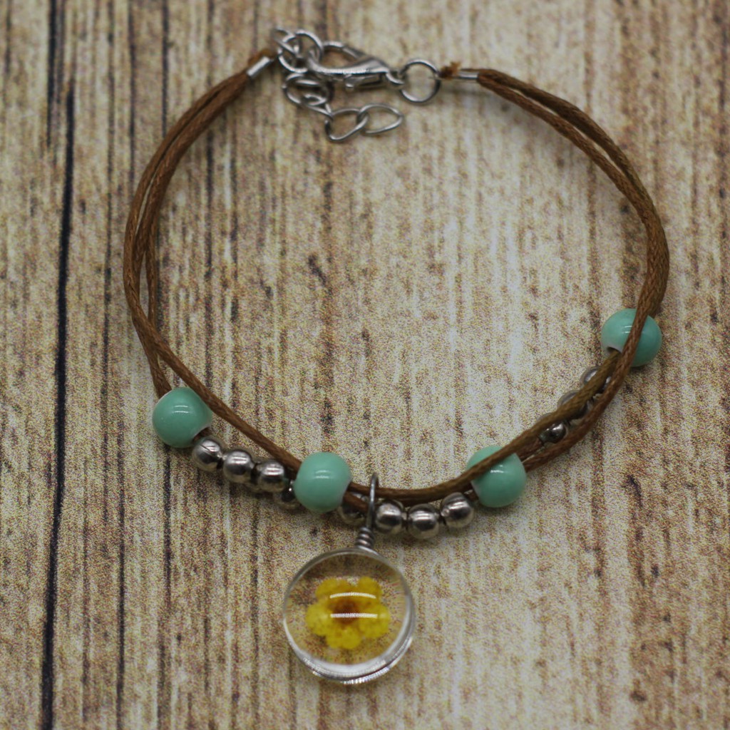 VT63 Vòng tay hạt gốm mặt hoa cúc 5 cái/lốc