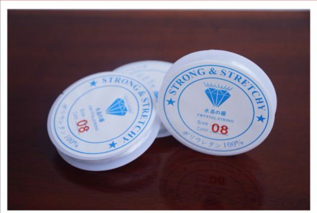 Cuộn chỉ xỏ chuỗi - dây gân giản bền chắc