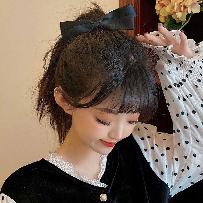 Dây cột tóc đính nơ xinh xắn dành cho nữ