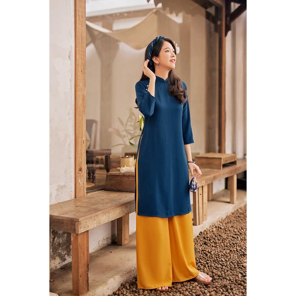 Áo Dài Cách Tân Trơn Dáng Xuông vải Đũi mặc mát thấm hút mồ hôi tốt.