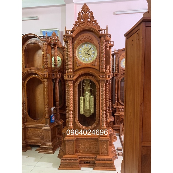 Đồng hồ cây tứ trụ cao 2m30 hương đá và mun đuôi công phun kiện đồng