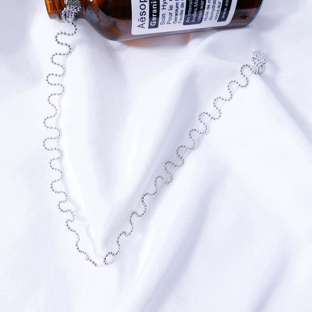 Vòng cổ dây bện đính hạt nhỏ