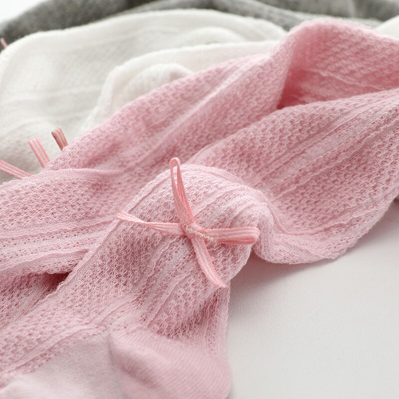 Quần tất cotton mềm mại đính nơ nhỏ thoáng khí màu trơn dễ thương cho trẻ em