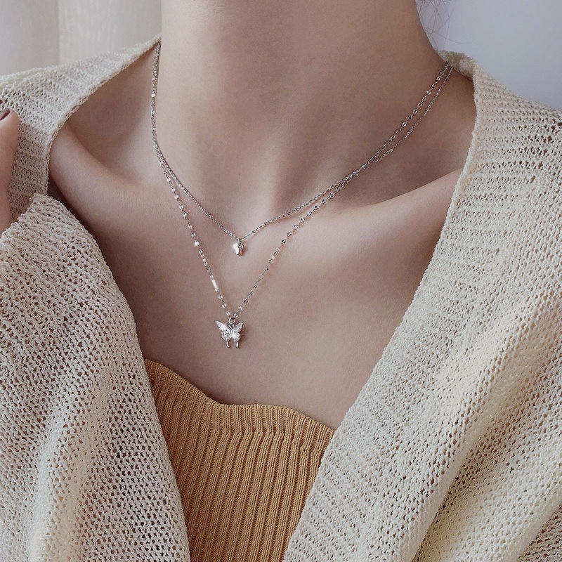 Dây chuyền bạc đeo sát cổ mặt hình bướm đính pha lê nhân tạo kiểu dáng thanh lịch dành cho bạn nữ