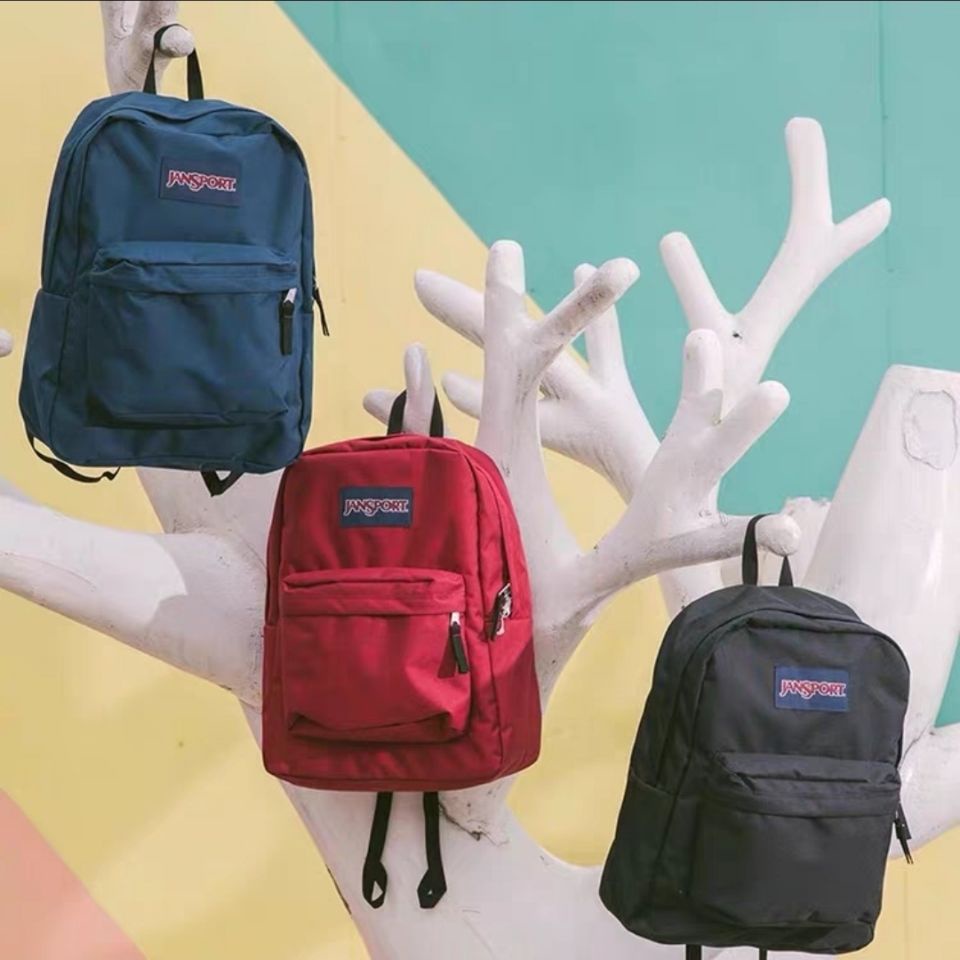 JanSport Jasper chính thức đích thực cổ điển rắn màu ba lô học sinh túi đi học nam và nữ xu hướng ba lô máy tính