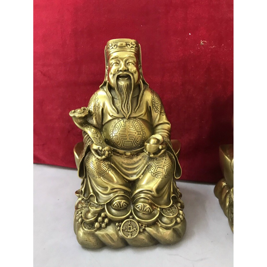 Thần tài Thổ địa ngồi thỏi vàng