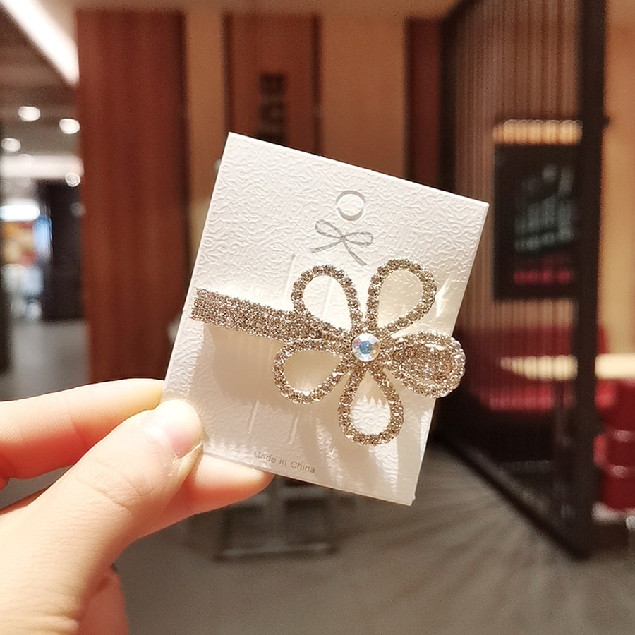 Kẹp tóc đính ngọc trai nhân tạo hình bông hoa xinh xắn cho nữ