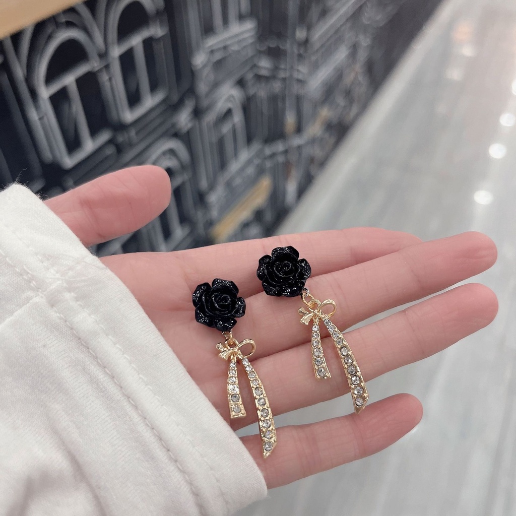 Khuyên tai kẹp không bấm lỗ chốt cố định K025 bằng hợp kim mạ bạc hình bông hoa kèm nơ đính đá dáng midi Leous