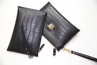 Clutch cầm tay da rắn