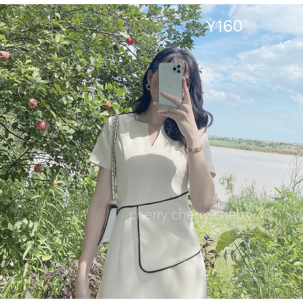 Váy văn phòng cổ V vạt eo tôn giáng tự tin