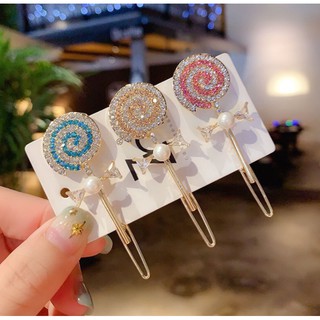 Kẹp tóc kẹo mút xoắn đính đá xinh xắn