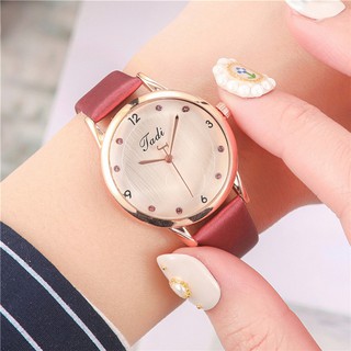 Đồng hồ nữ dây da mặt tròn Tadi chính hãng thời trang giá rẻ chống nước chống xước tiêu chuẩn