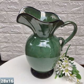 Bình sữa cắm hoa màu xanh hỏa biến.