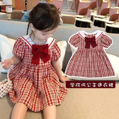 Đầm Yếm Kẻ Sọc Thắt Nơ Hàn Quốc Cho Bé Gái