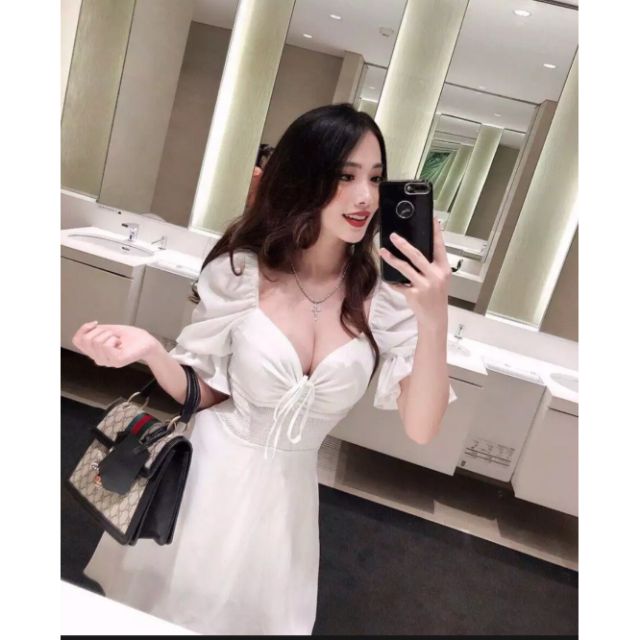 Đầm xòe tay phồng dây rút