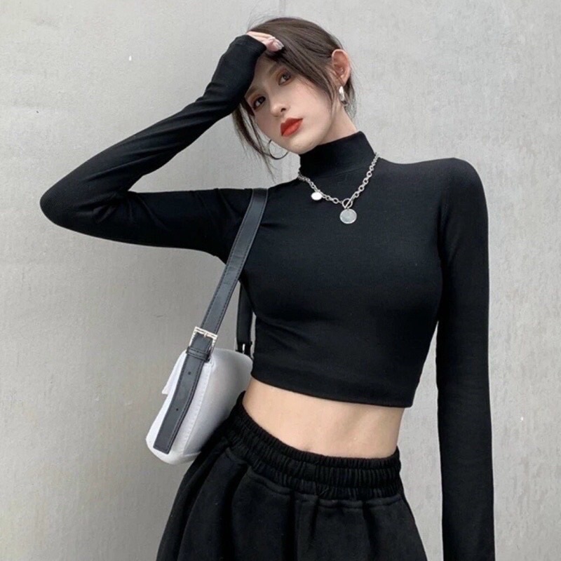 Áo croptop cổ cao dáng ôm tay dài, chất thun mềm mại bao test, có 3 màu trắng đen nude, free size dưới 56kg