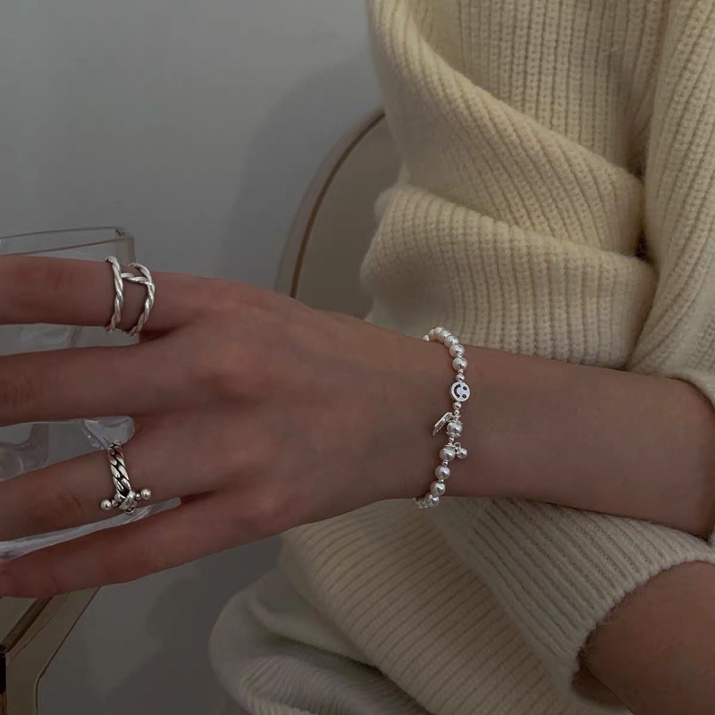 Vòng tay dây cước charm mạ bạc ngọc trai nhân tạo