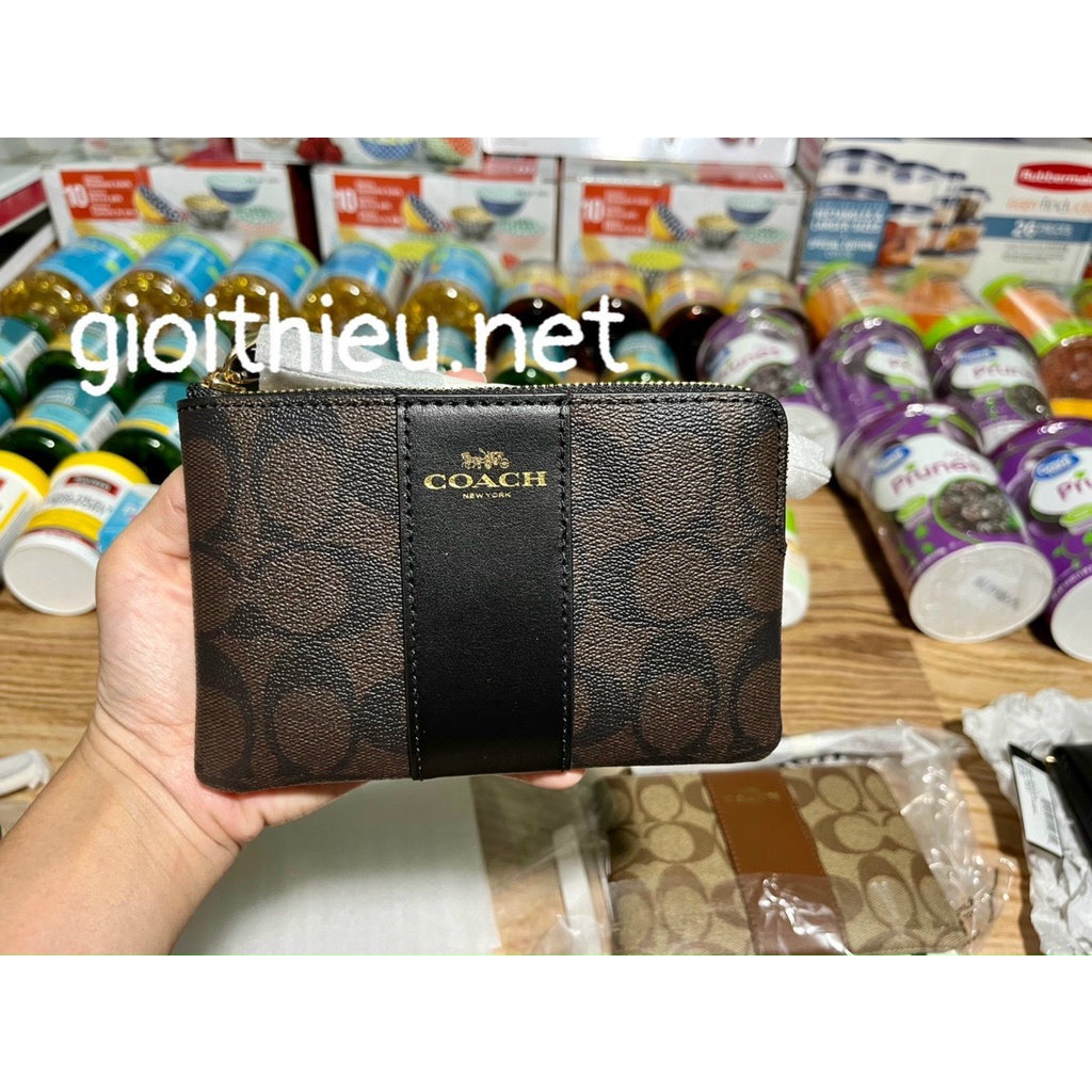 Ví cằm tay thương hiệu Coach màu đen