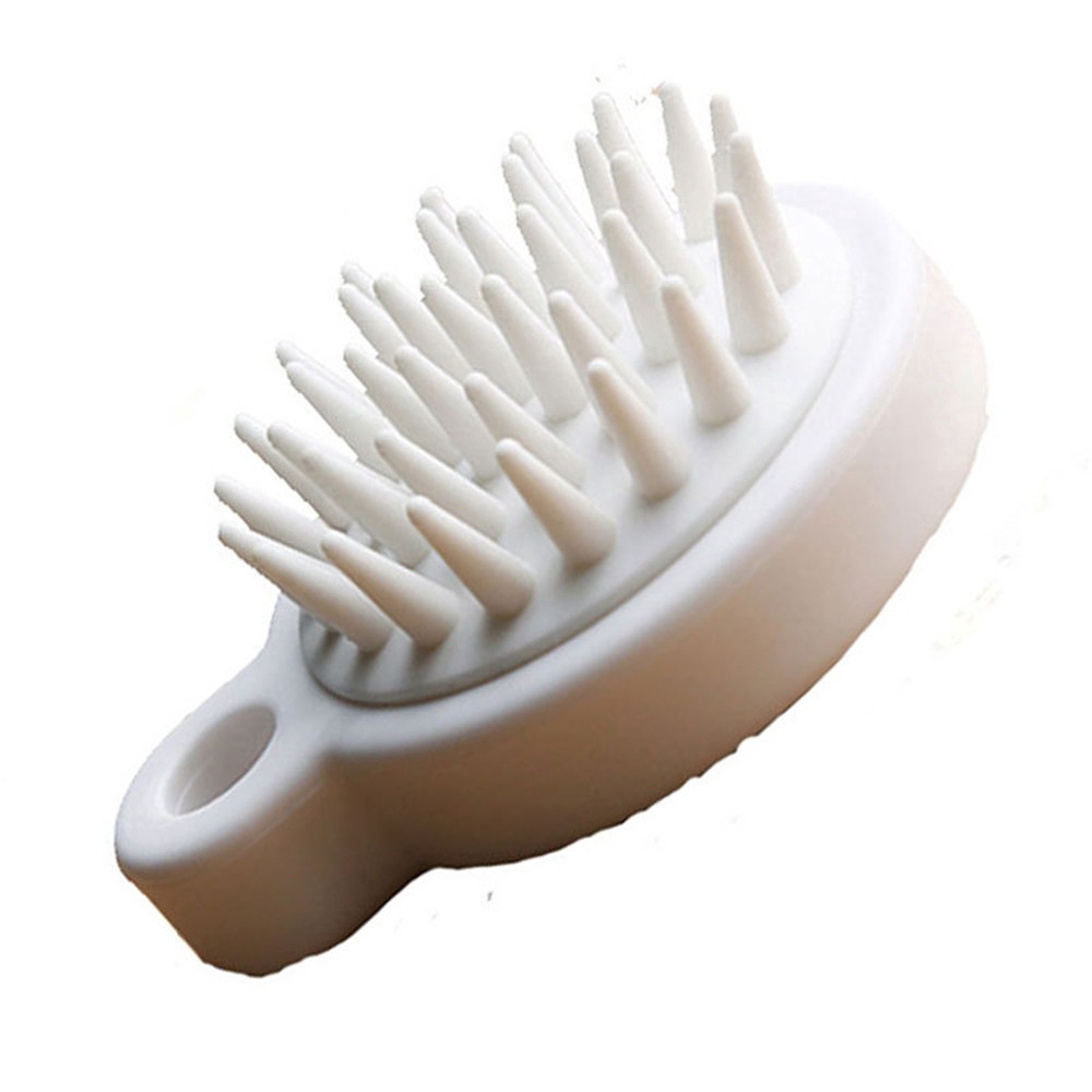 Lược mát xa da đầu mini cầm tay bằng silicon tiện dụng