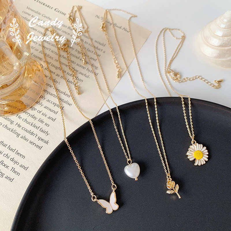 Vòng cổ mặt hình hoa hồng và bướm đính ngọc trai phong cách mùa hè thời trang mới 2021