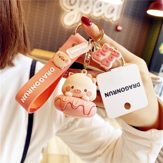 Móc khóa con heo bánh donut